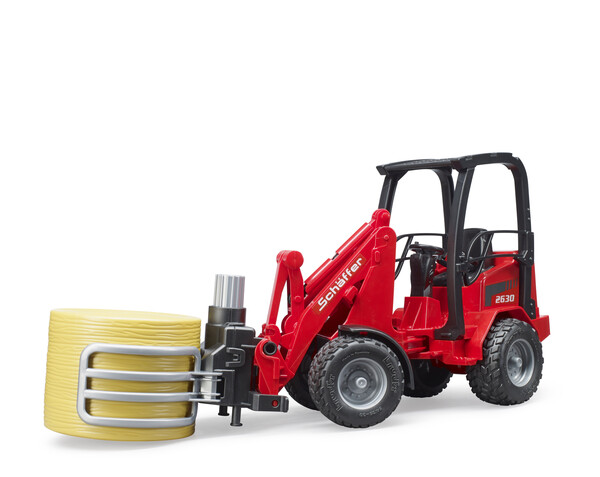 Погрузчик SCHAEFFER с рулоном Bruder вид 1